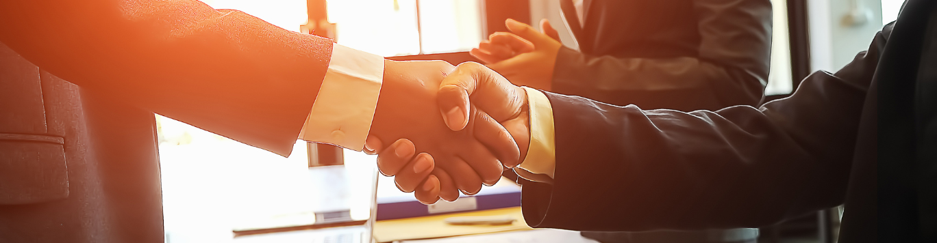 Baker's Gas Two businessmen shaking hands