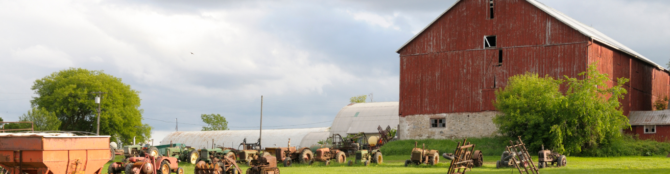 Baker's Gas Farm with tractors parked on the hill