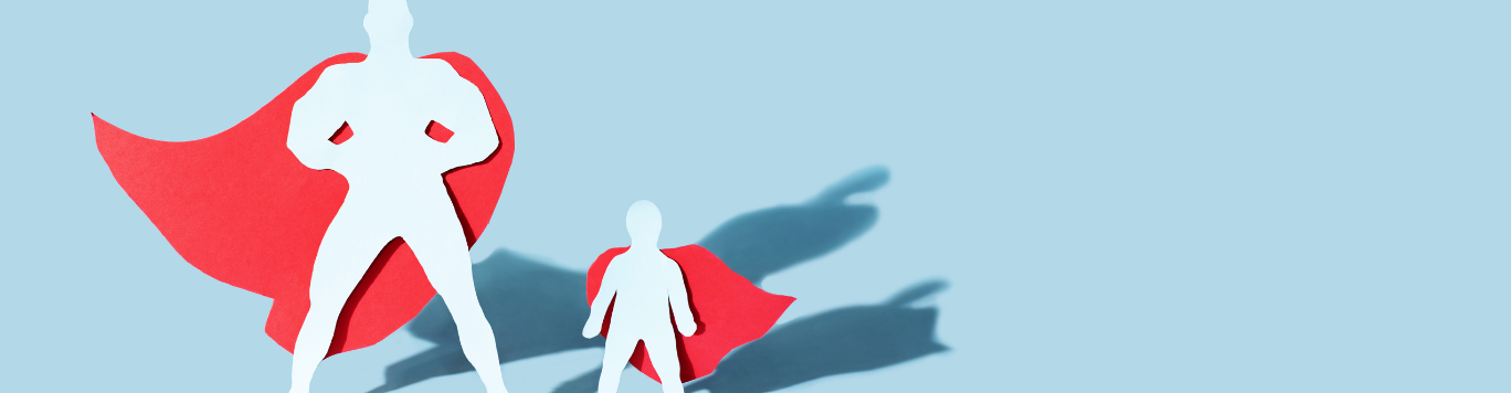 Baker's Gas Father and son figures with superhero capes