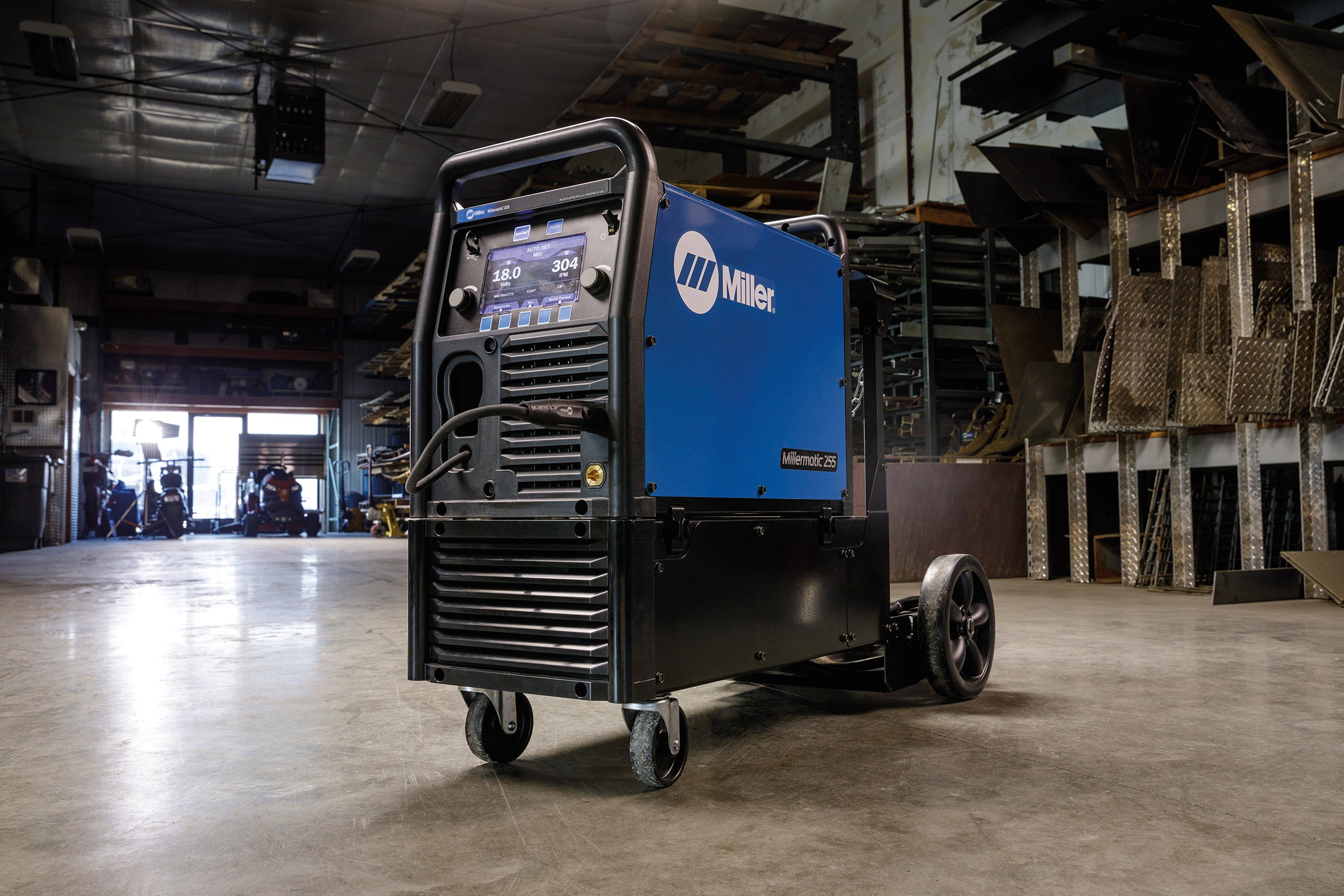 Baker's Gas Millermatic 255 on the EZ Latch cart in workshop