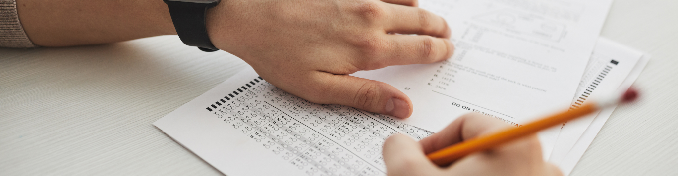 Baker's Gas Person writing on a test