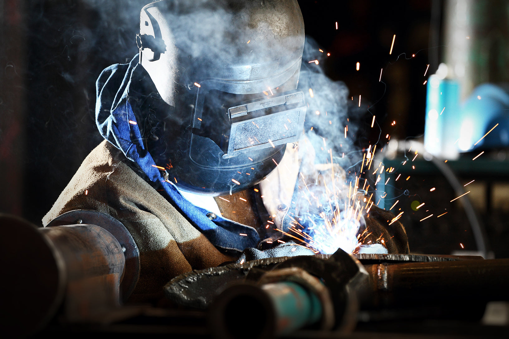 Baker's Gas Person welding keeping their eyes protected